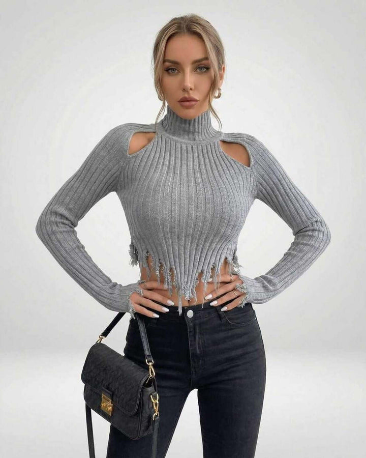 Suéter de mujer acanalado con escote moderno, corte ajustado. Prenda esencial para un look invernal sofisticado.