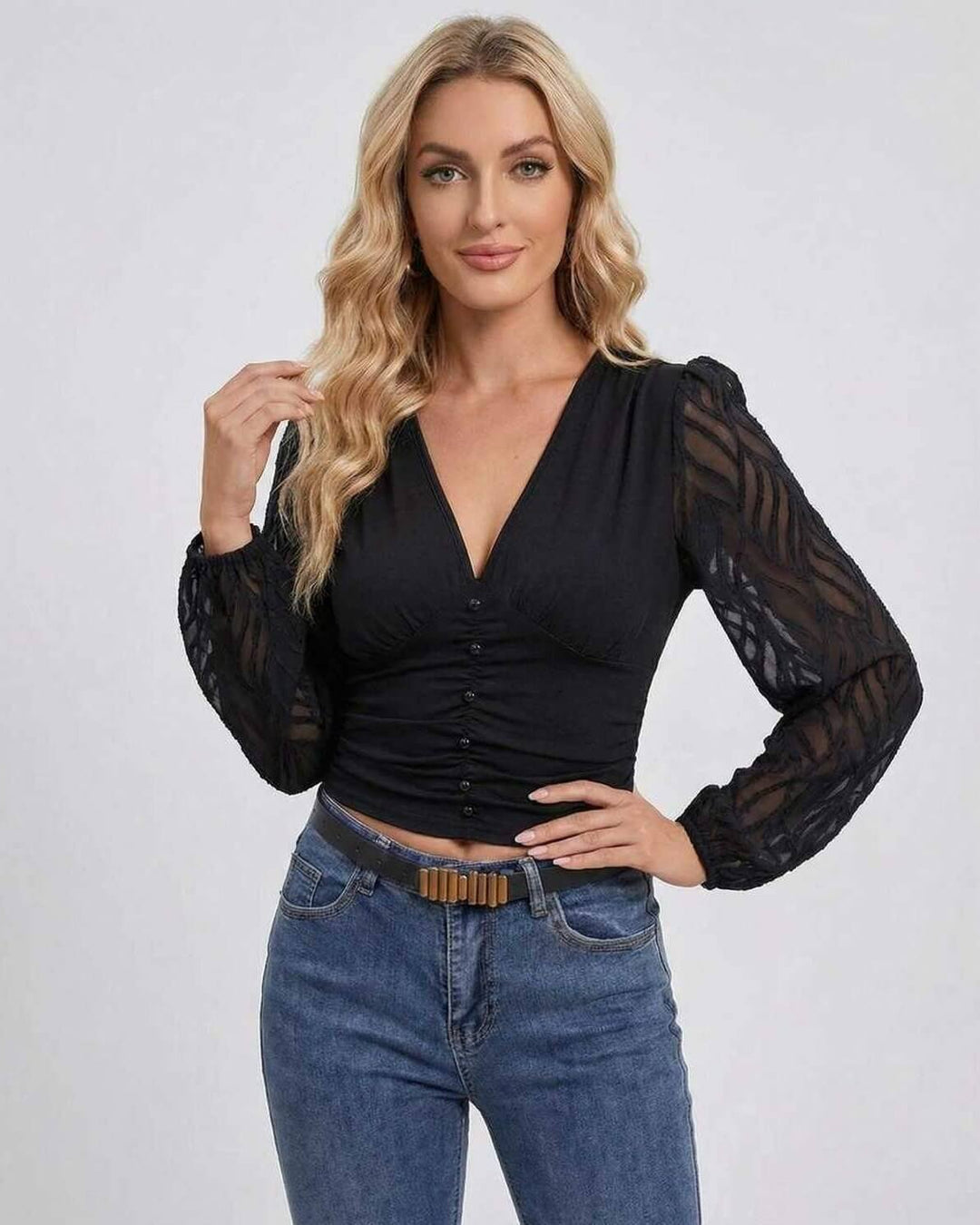 Suéter de mujer negro, cómodo y elegante con escote V y mangas farol. Ideal para ropa casual de otoño/invierno.