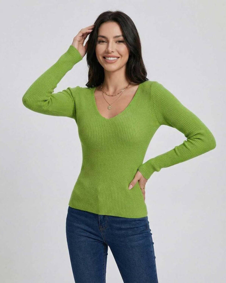 Suéter de mujer V-neck elegante, ajuste ceñido y manga larga. Prenda versátil para un estilo sofisticado.