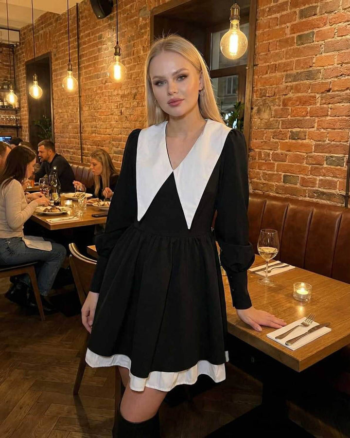 Vestido mini elegante de mujer con cuello solapa y patchwork blanco y negro. Perfecto para casual chic o fiesta.