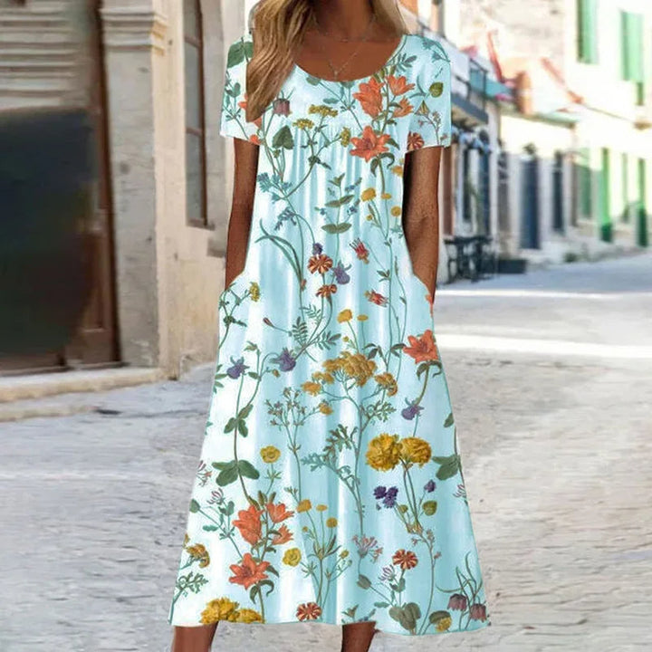 Vestido de verano estampado floral, mangas cortas, ajuste fluido para mujer, elegante y versátil.