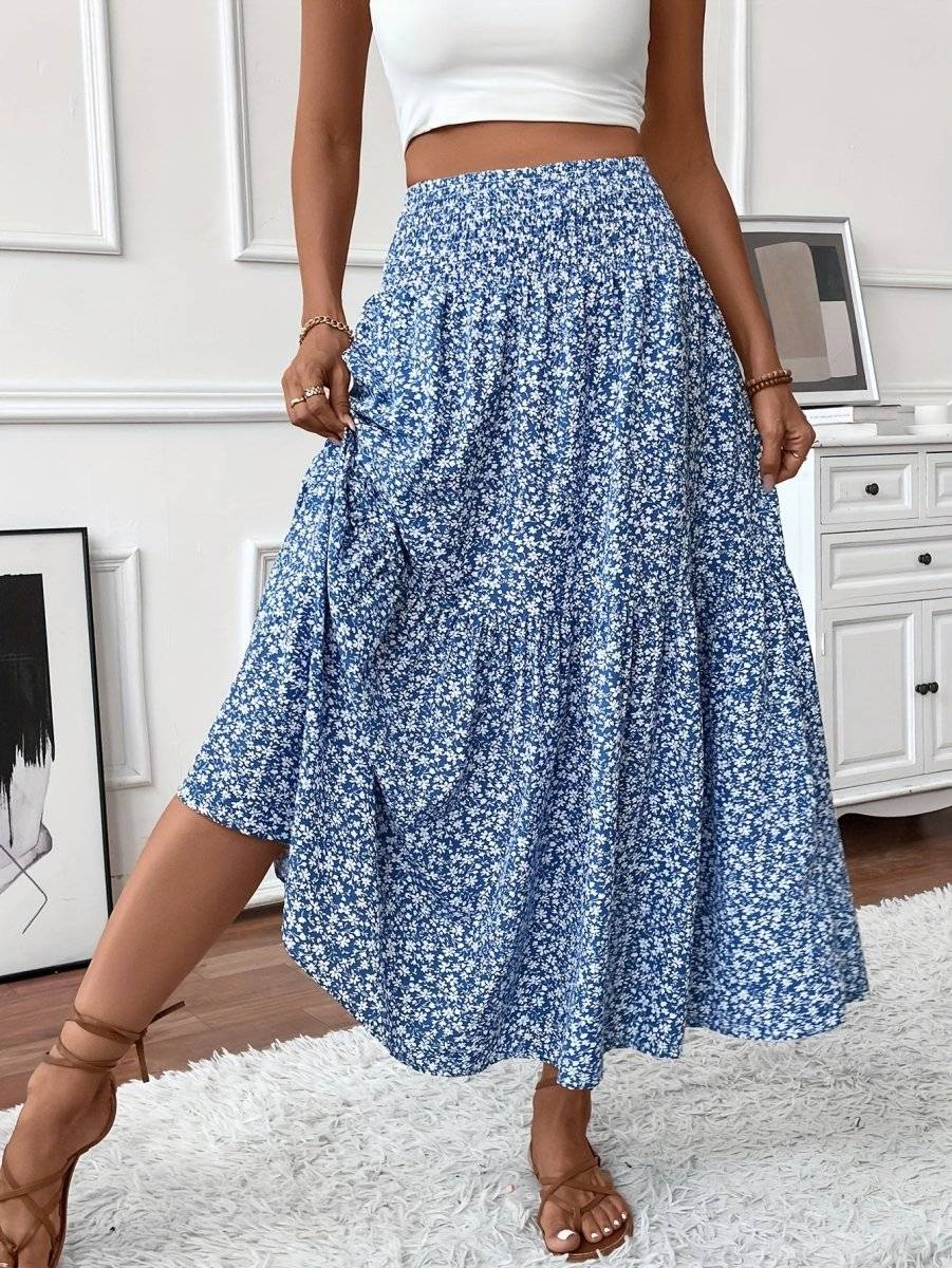 Falda larga de verano con patrón floral bohemio, tela fluida y diseño femenino para días soleados.