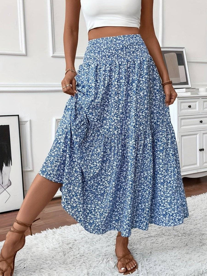 Falda larga de verano con patrón floral bohemio, tela fluida y diseño femenino para días soleados.