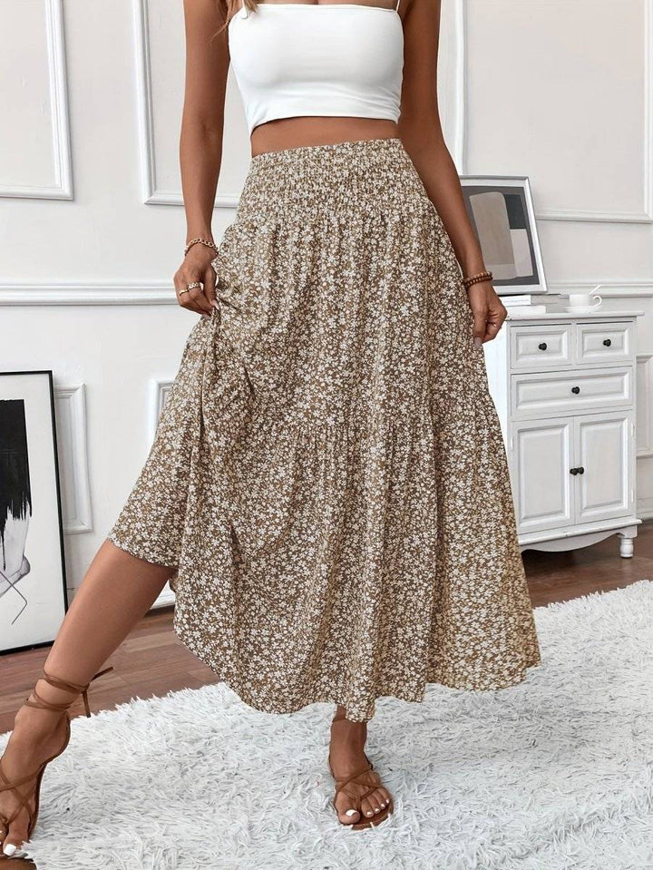 Falda larga boho floral para mujeres, ideal para verano o playa. Vuelo ligero y estampado vibrante.