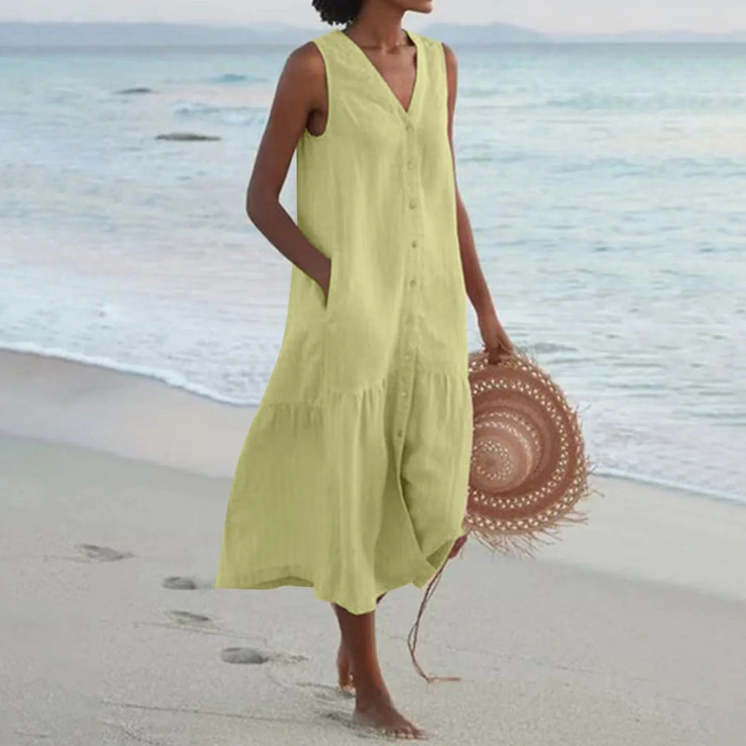 Vestido midi de mujer estilo bohemio con botonadura frontal y falda fluida de capas para un look fresco.