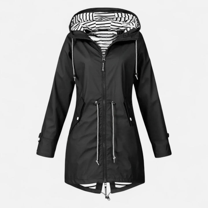 Chaqueta femenina transpirable y compacta, ideal como cortavientos para viajes y días de lluvia.