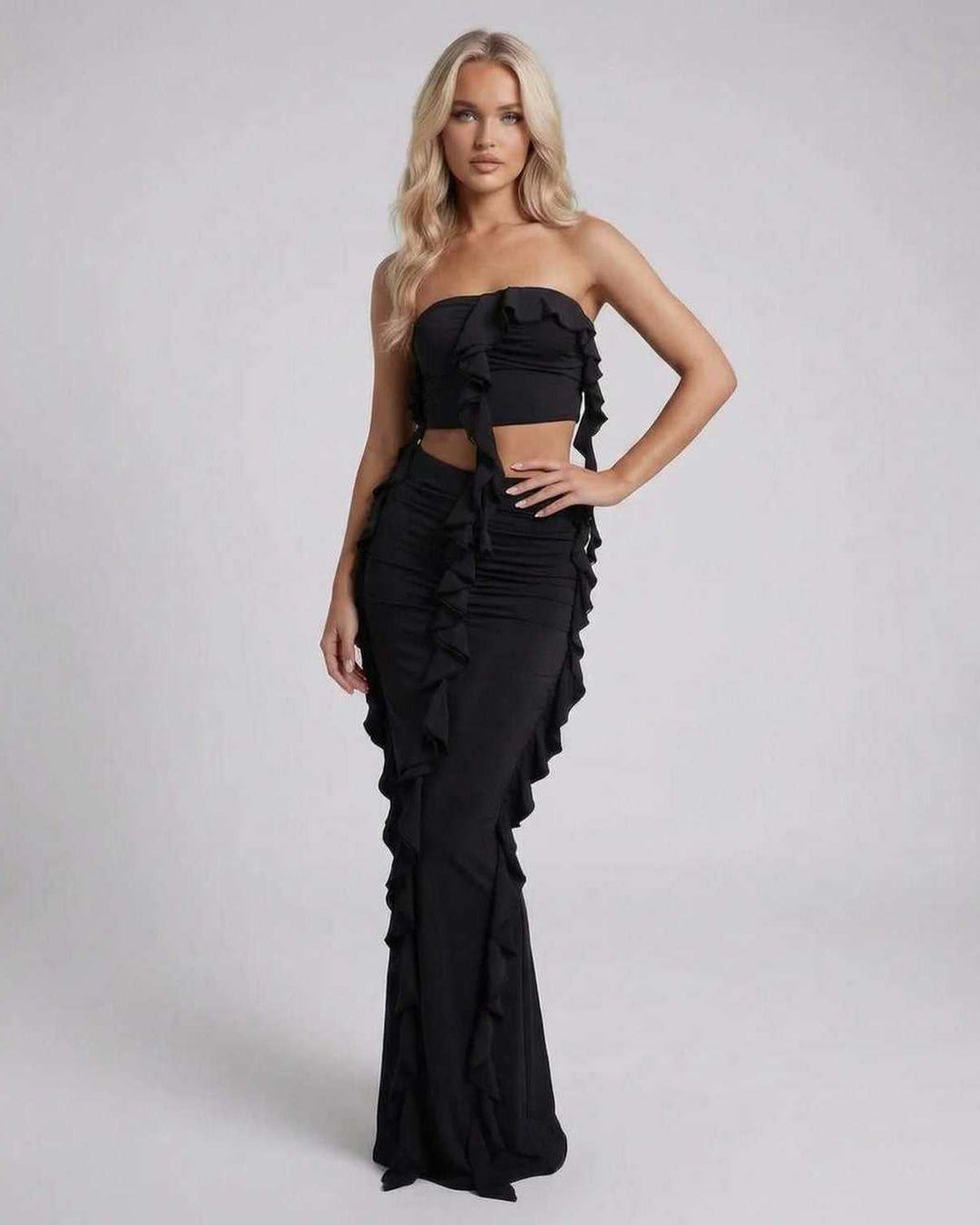 Vestido maxi negro sin mangas para mujer, elegante, con volantes. Moda ideal para noche y fiesta.