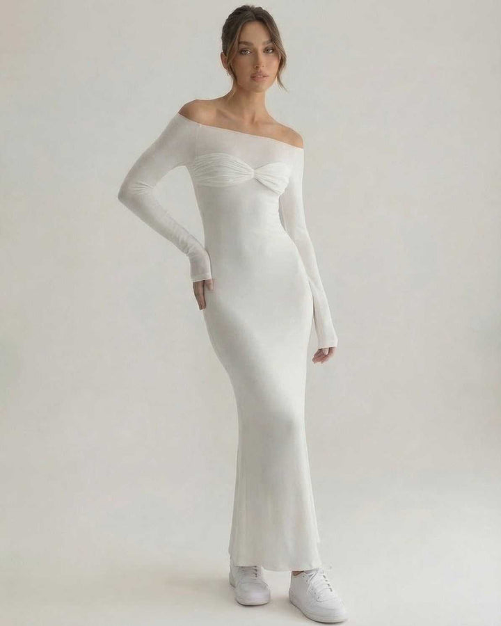 Vestido blanco ajustado de noche para mujer, estilo sofisticado y elegante, ideal para fiestas y eventos.