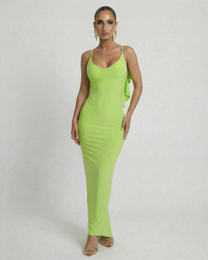 Vestido de noche verde lima para mujer, maxi y elegante. Con volantes y espalda descubierta, perfecto para ocasiones.