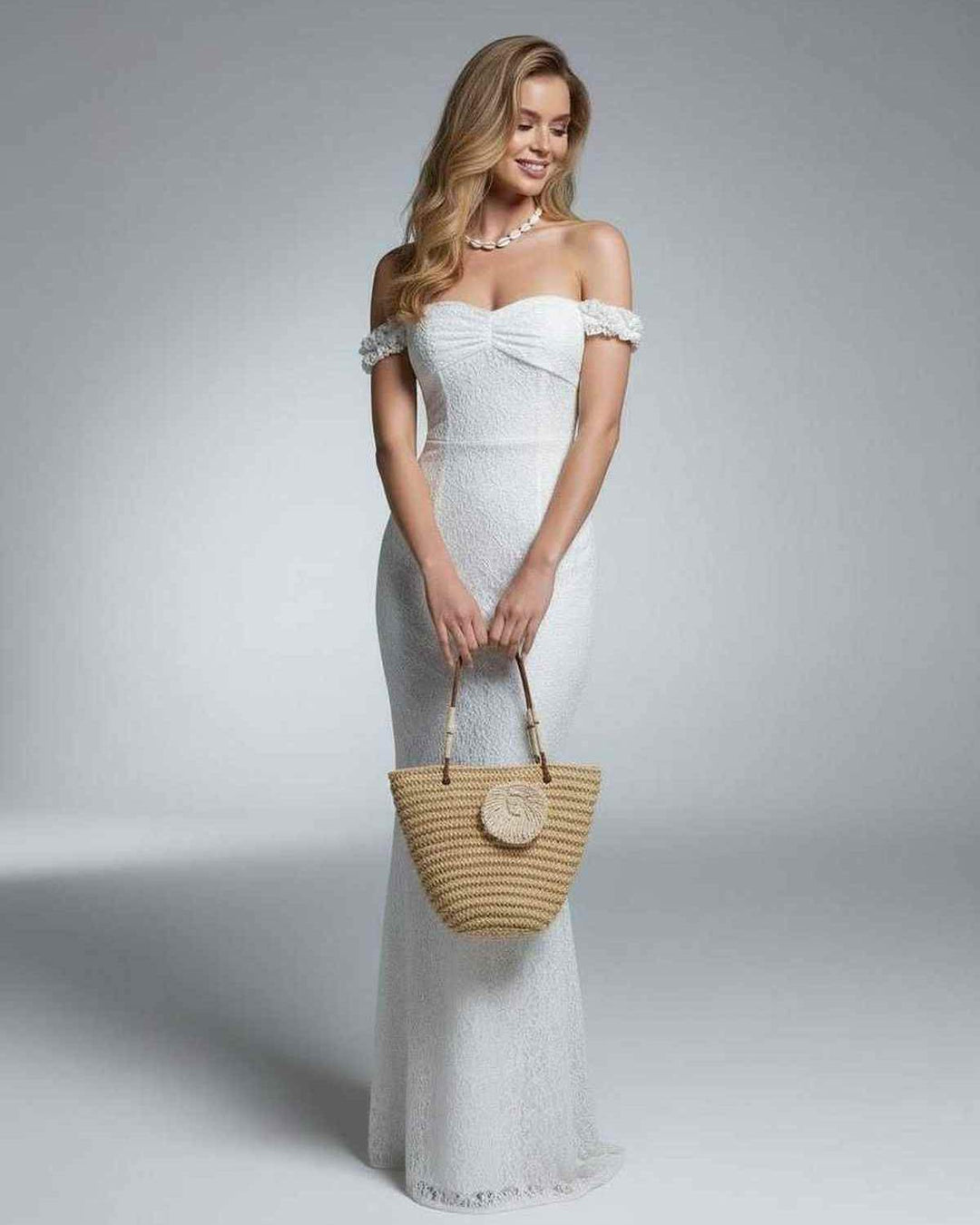 Vestido maxi para mujer, blanco y elegante, con hombros descubiertos. Ideal para eventos y moda de verano.