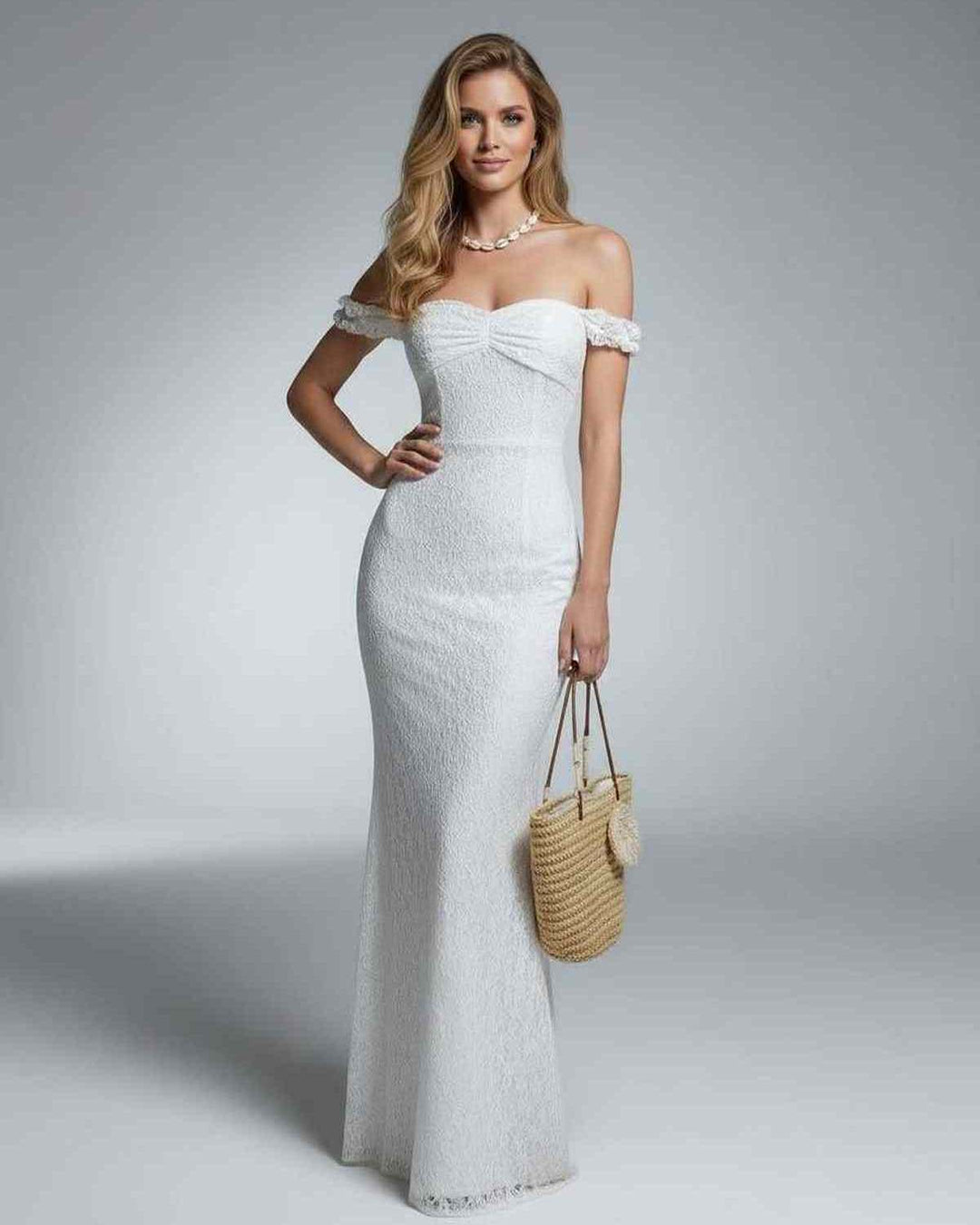Vestido maxi blanco de fiesta para mujer, con elegantes hombros descubiertos. Perfecto para lucir con estilo.