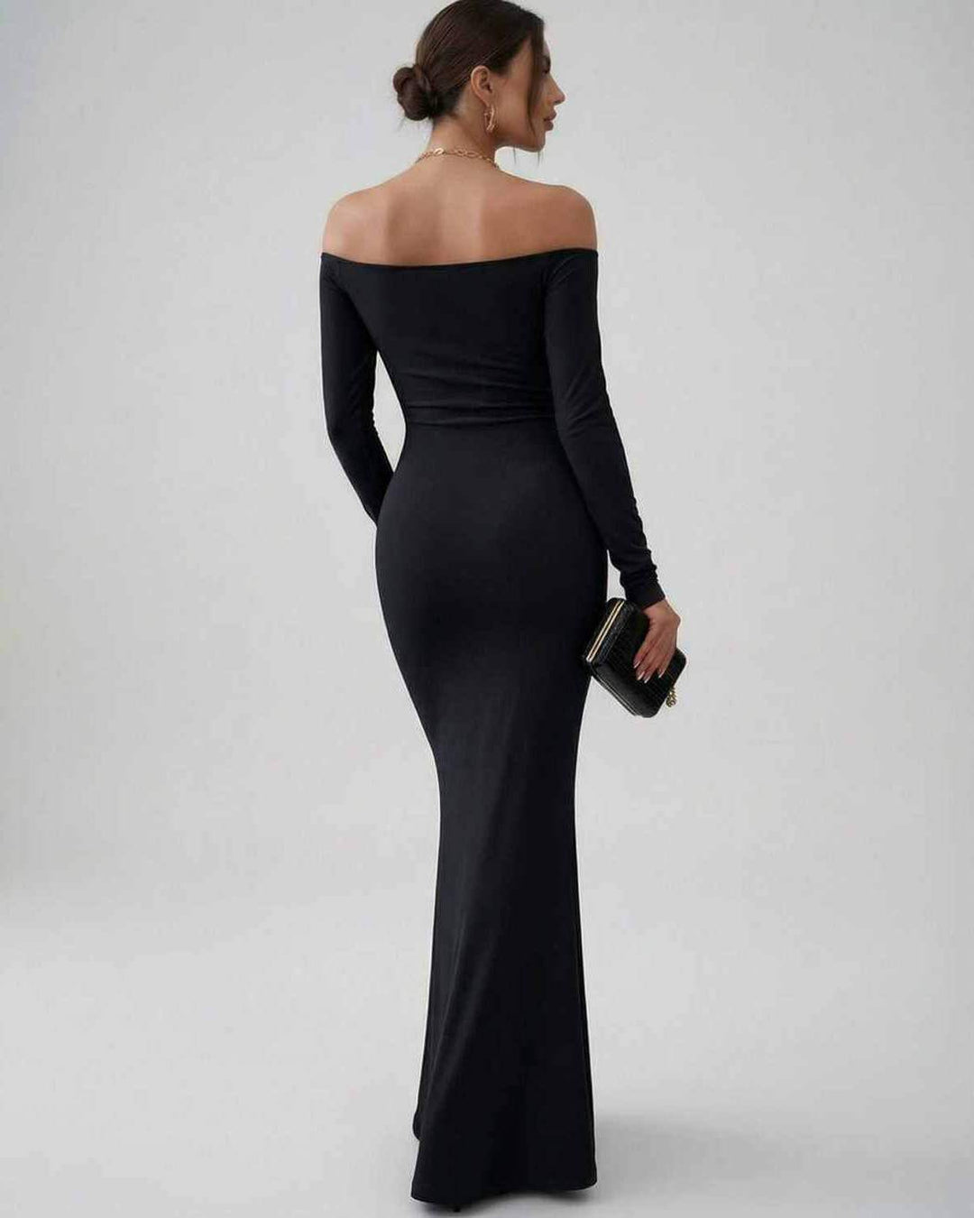 Vestido de noche maxi para mujer, negro, con escote off-shoulder. Ideal para eventos formales y ocasiones especiales.