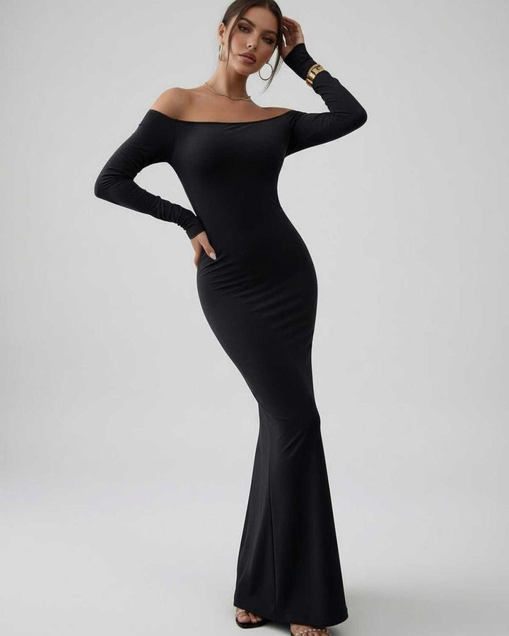 Vestido formal negro maxi con hombros descubiertos y manga larga. Un diseño elegante para mujer en cualquier ocasión especial.
