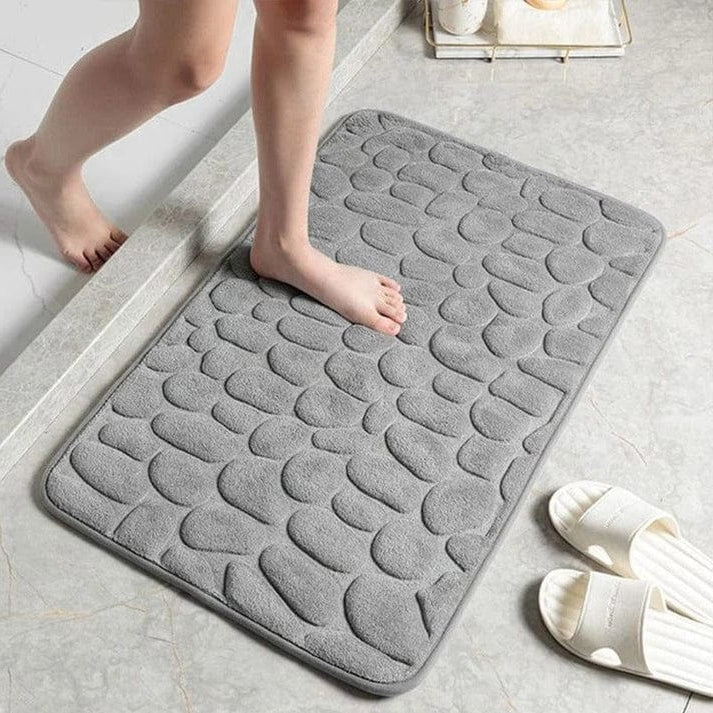 Alfombrilla de ducha absorbente para baño, mantiene los pies secos y ofrece confort después de la ducha.