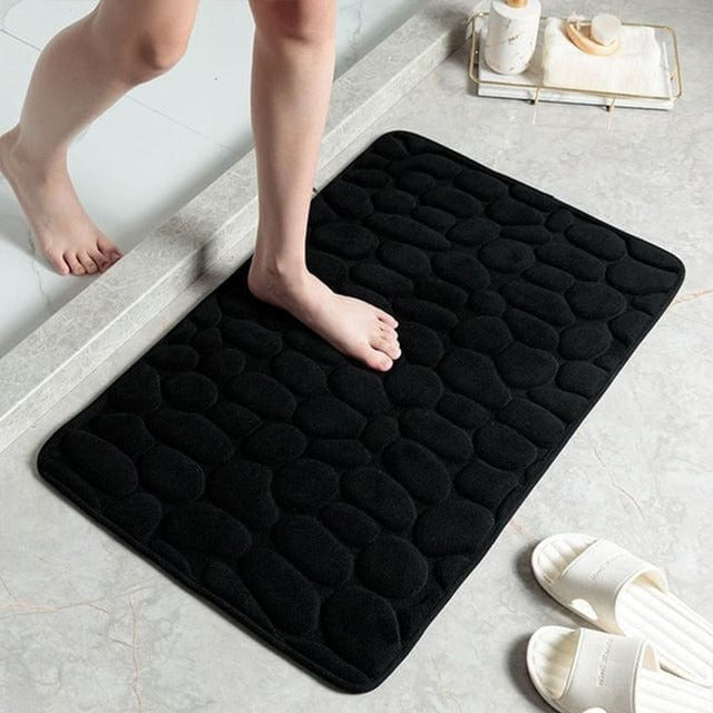 Alfombrilla de ducha antideslizante premium para baño. Máxima seguridad, confort y absorbencia en tu hogar.