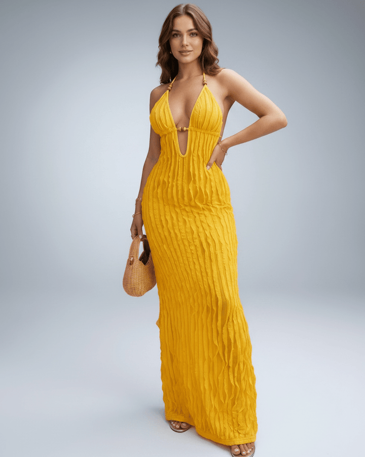 Vestido de fiesta, cuello halter, escote V. Elegante, sin mangas, para invitada de boda chic.