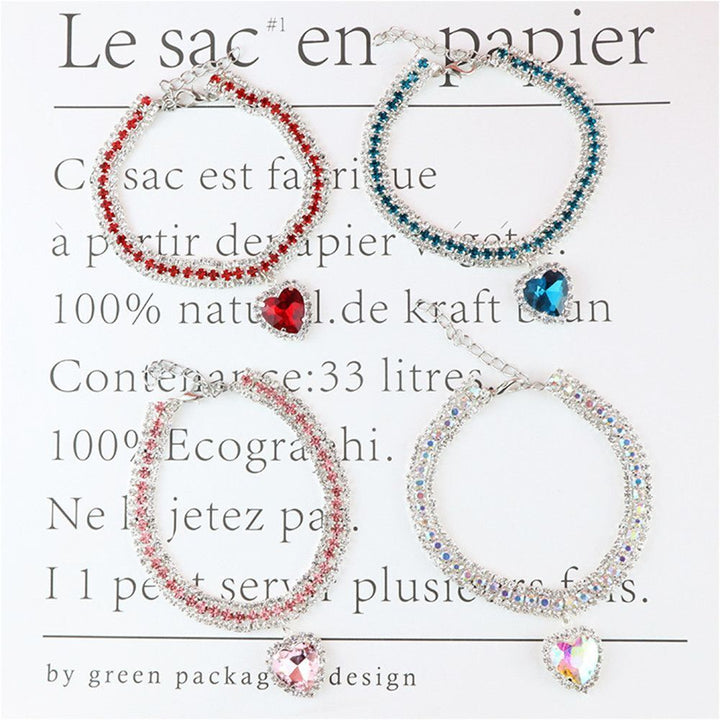 Collar de gato reflectante con corazón y cristales. Ajustable, liberación rápida, máxima seguridad nocturna.