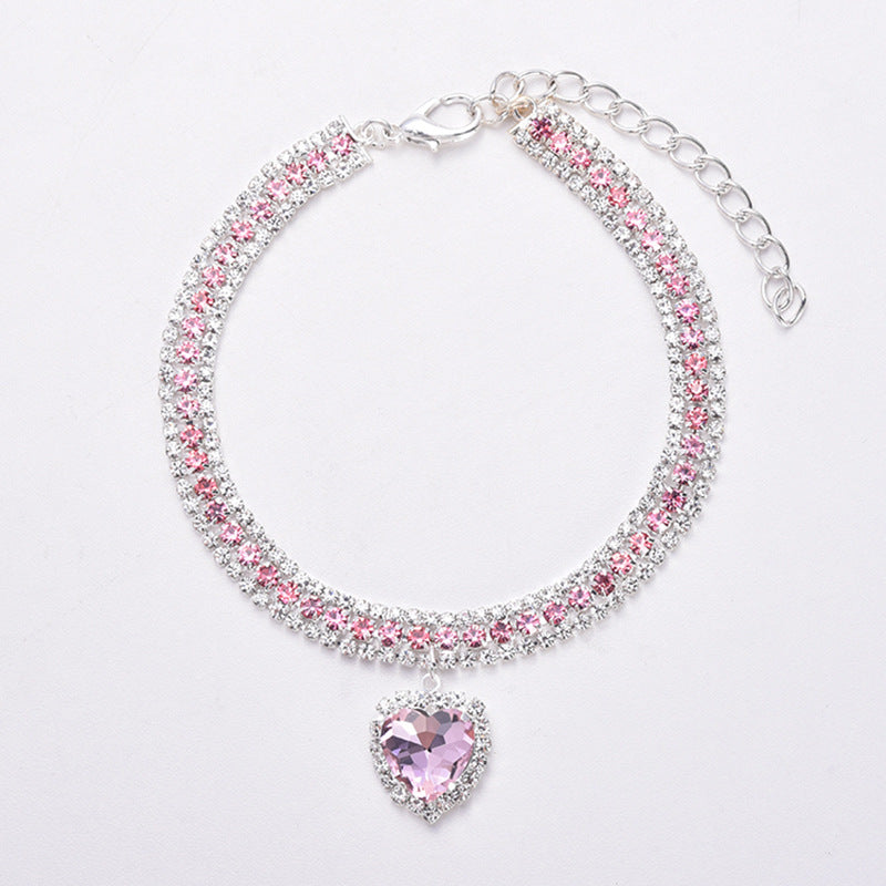 Collar de lujo para gatos con corazón reflectante, cristal y strass. Ajustable para el confort de tu mascota.