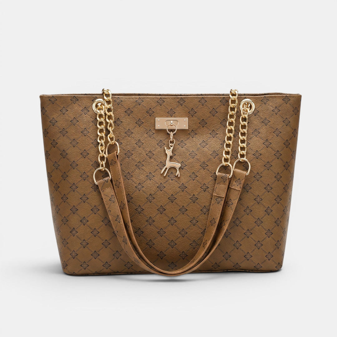 Bolso de mujer de cuero con cadena, ideal para el hombro. Estilo elegante y chic, accesorio clave.