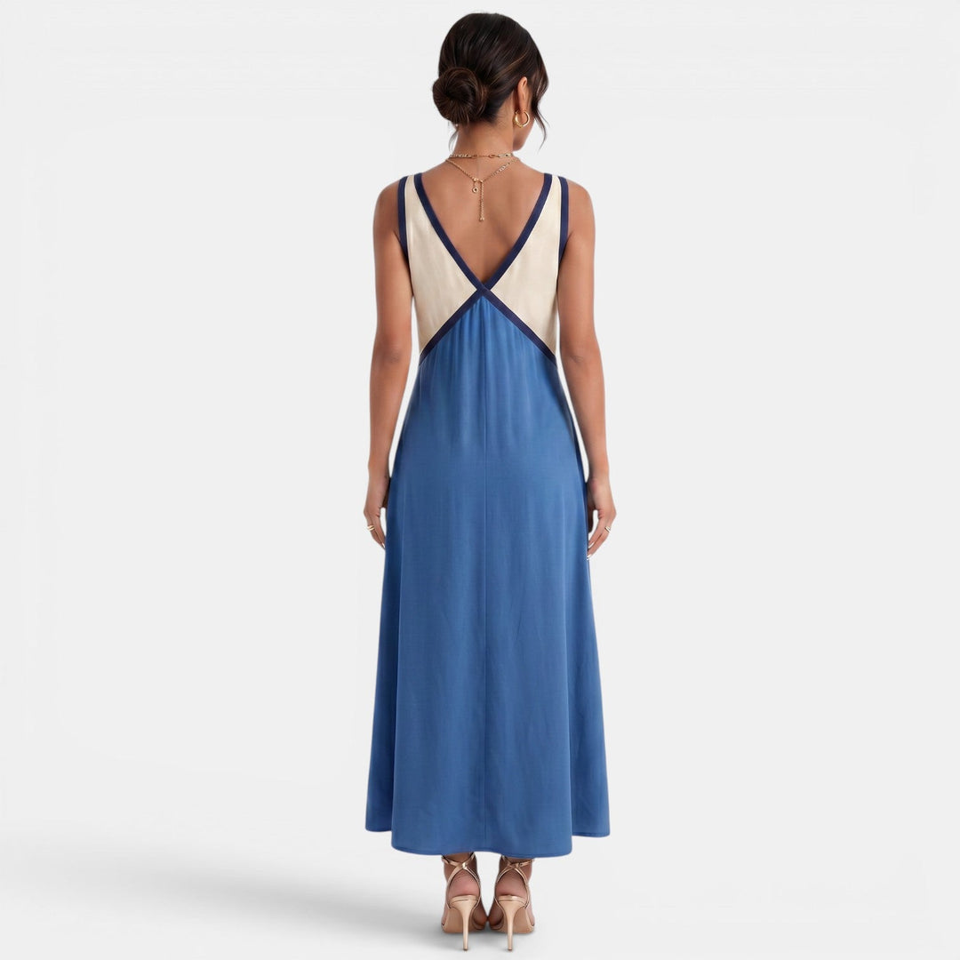 Vestido maxi boho para mujer con estampado floral vibrante, ideal para el verano, estilo casual y de playa.