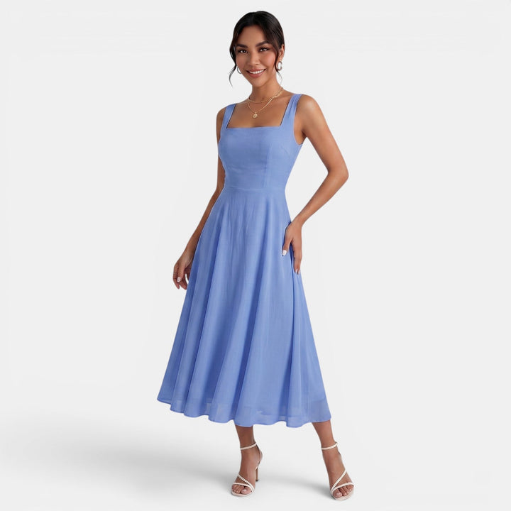 Vestido midi negro con tirantes finos, look elegante de verano para mujer, versátil.