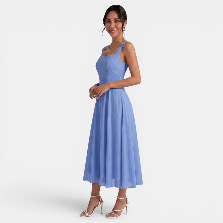 Vestido de verano midi casual para mujer, diseño fresco y elegante, disponible en varios colores.