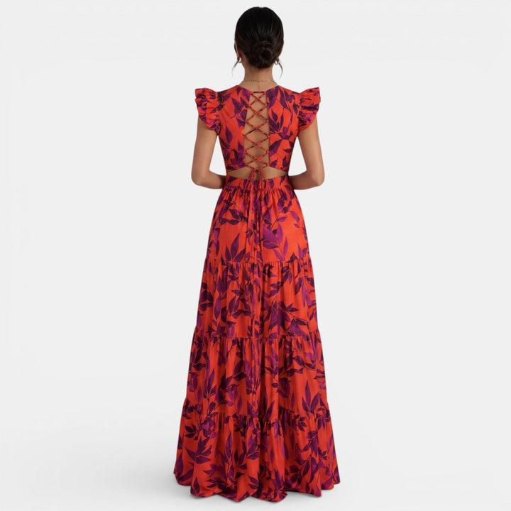 Elegante vestido largo rojo con volantes y estampado único, perfecto para mujer en eventos especiales.