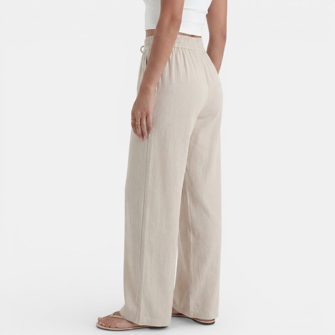 Pantalón de lino holgado y cómodo para mujer, versátil para looks casuales y elegantes de verano.