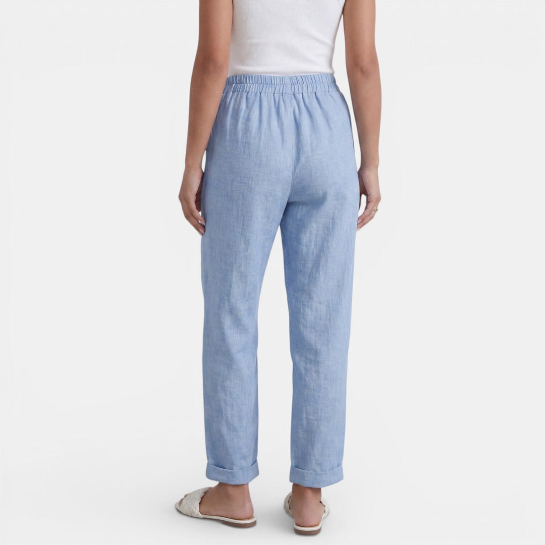 Cómodo pantalón de lino mujer, cintura alta, transpirable y chic, ideal para viajes de verano.
