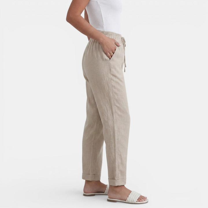 Versátil pantalón de lino mujer, cintura alta, fresco y elegante, perfecto para ocasiones de verano.