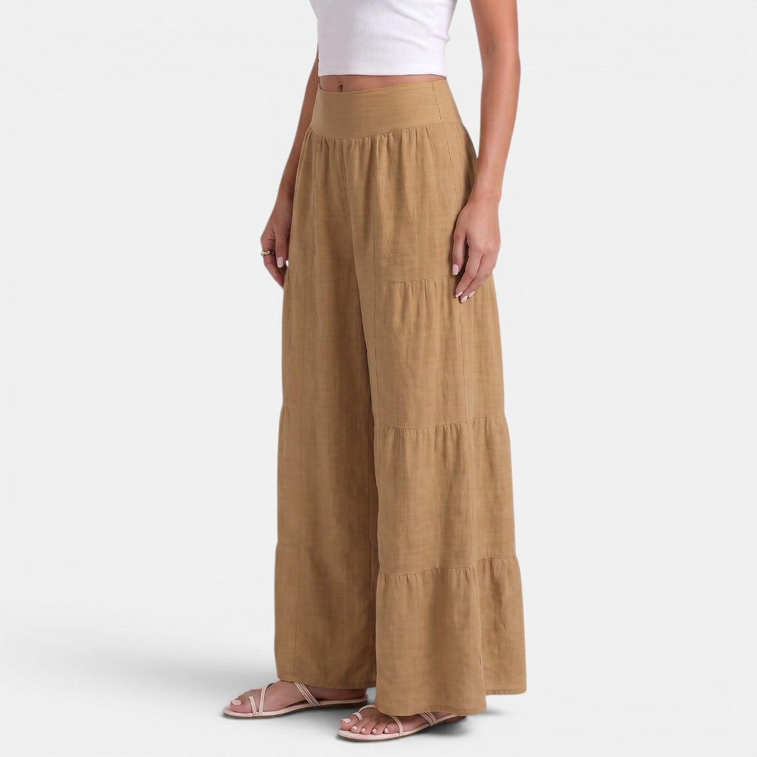 Textura del pantalón de lino ancho para mujer, detalle del tejido fresco y transpirable.
