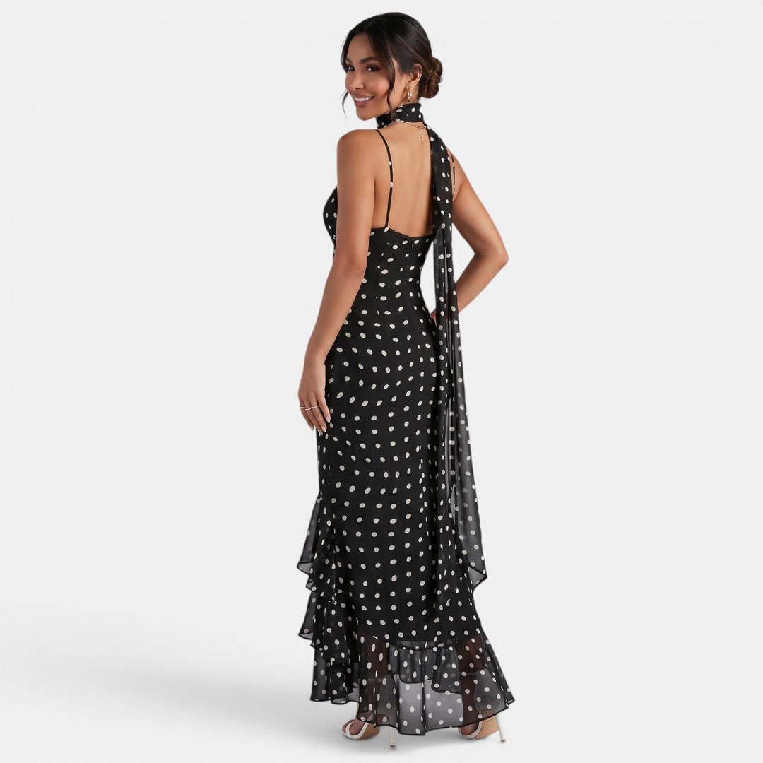 Vestido maxi halter de lunares para mujer, color negro elegante, silueta fluida y fresca, ideal para verano y fiestas.
