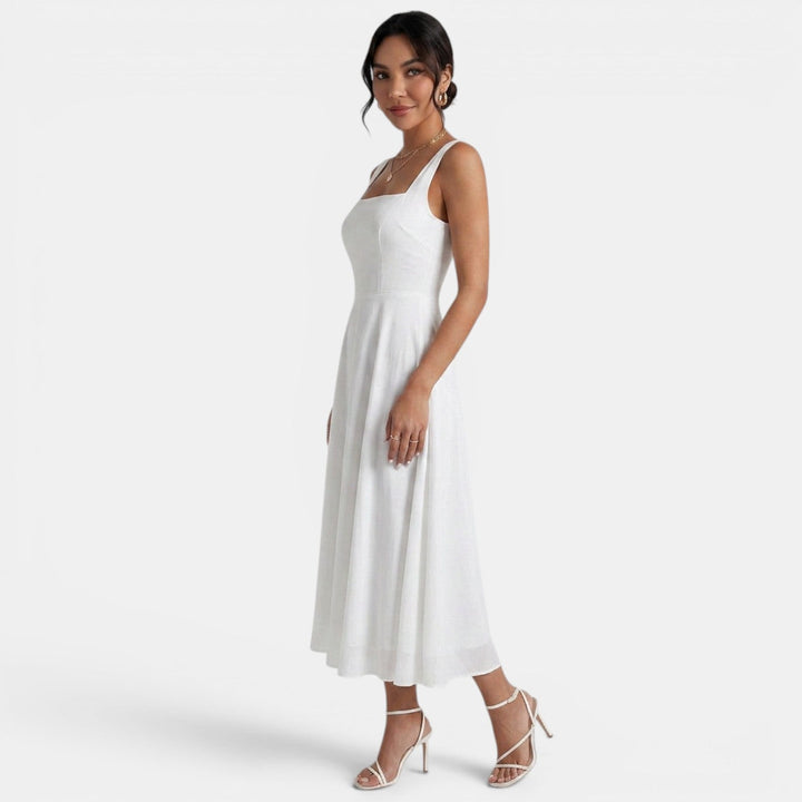 Vestido midi de tirantes blanco para mujer, ideal para moda casual de verano.