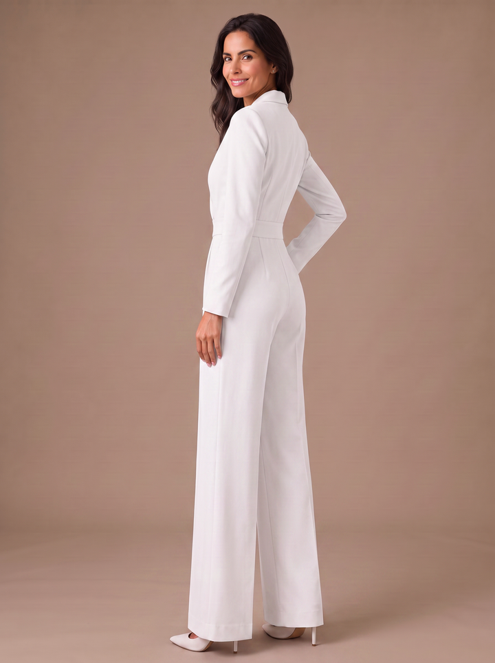 Mono casual elegante con escote V, manga larga y pernera ancha. Versátil para oficina, eventos o fiesta.
