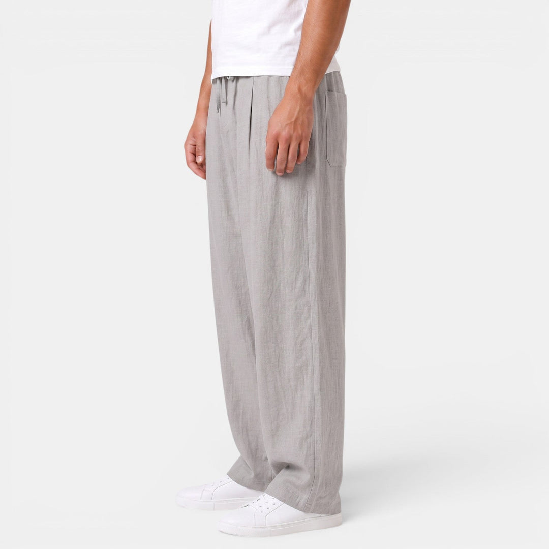 Pantalón de lino moderno para hombre, corte recto, fresco, perfecto para un estilo casual chic de verano.