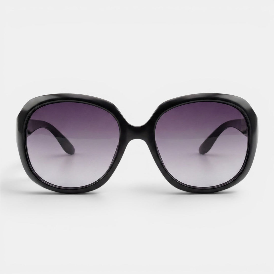 Gafas de sol negras oversize redondas, moda femenina, protección UV, accesorio veraniego.