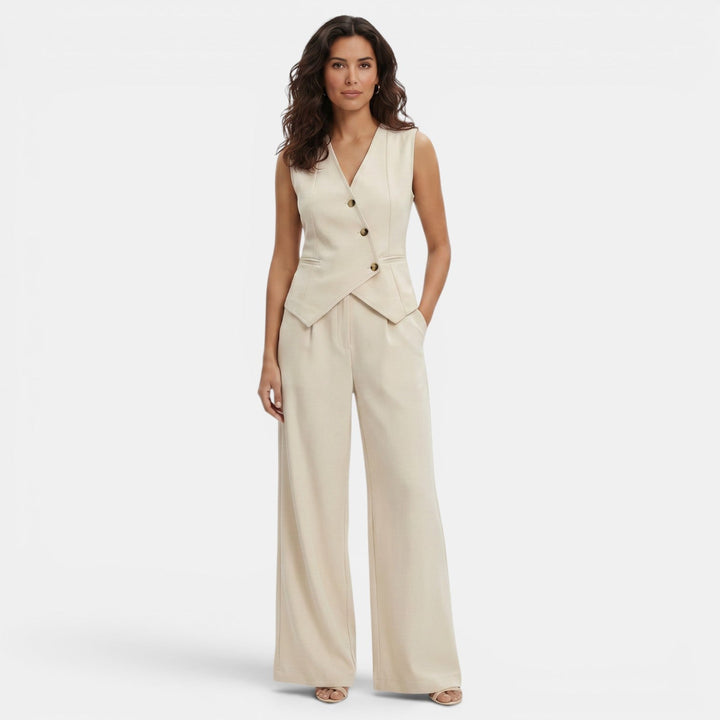 Conjunto elegante de chaleco y pantalón para mujer, ideal para oficina o eventos formales. Estilo chic.