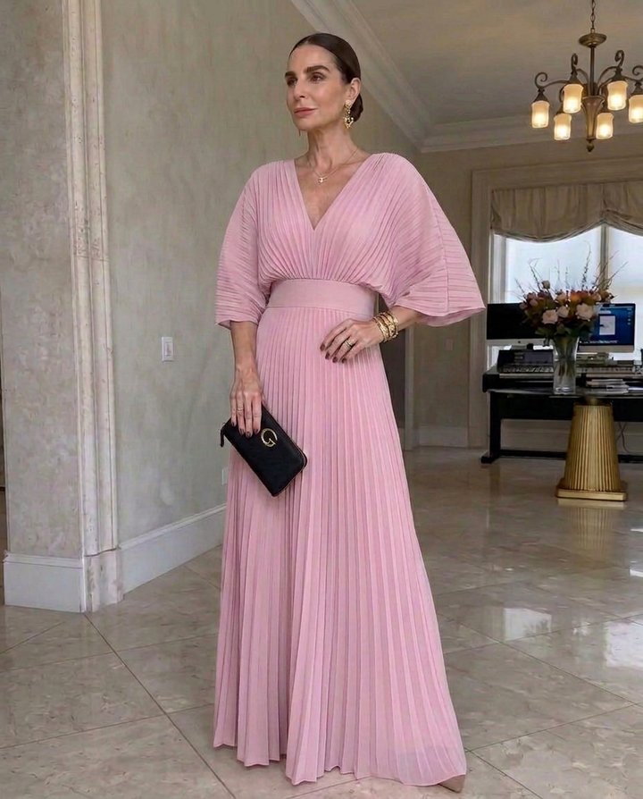 Vestido elegante de mujer, plisado, escote V, mangas fluidas. Ideal para ocasiones formales y fiestas.