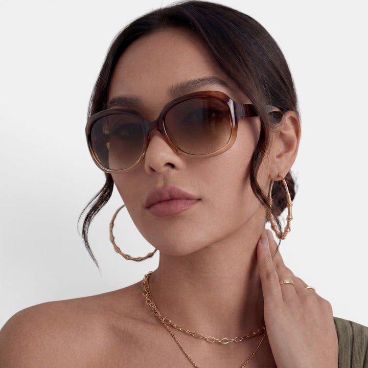 Elegantes gafas de sol redondas oversize, perfectas para la moda femenina de verano.