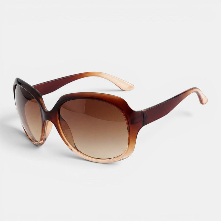 Moda femenina: gafas de sol redondas oversize, estilo moderno para el verano.