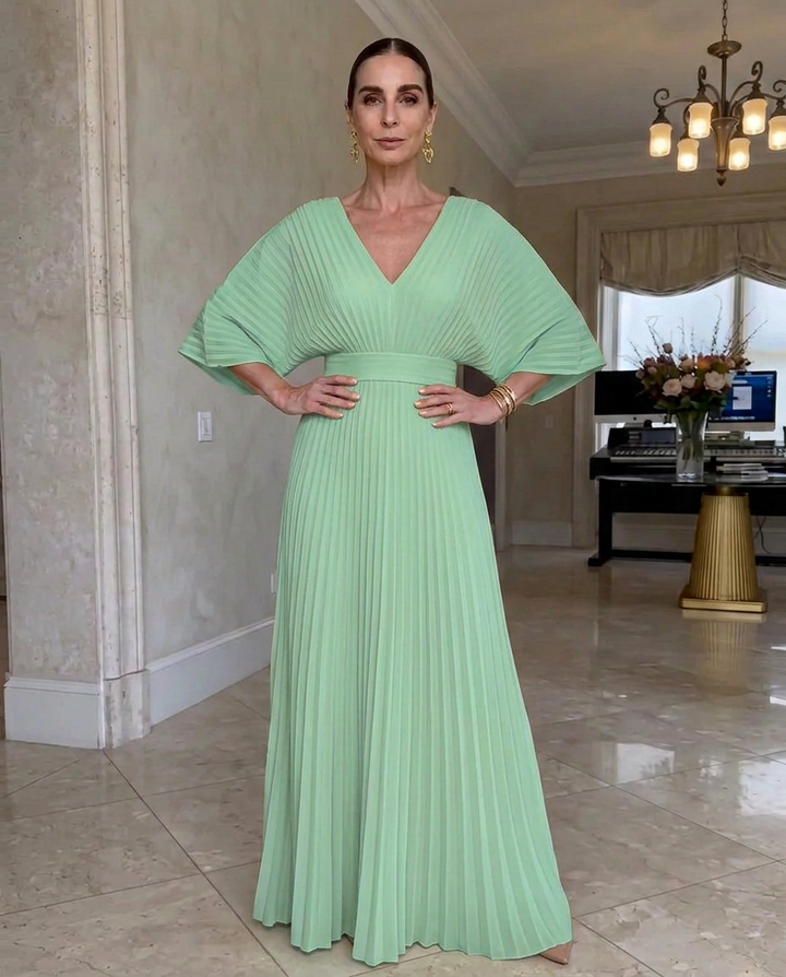 Vestido formal elegante de mujer con escote V y falda plisada, muy chic.