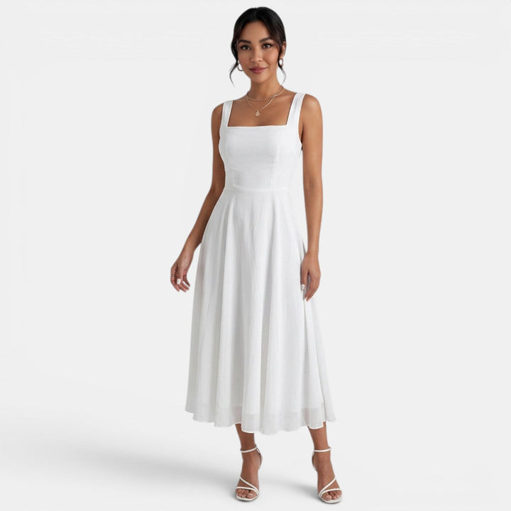 Vestido midi elegante de verano para mujer, perfecto para ocasiones casuales o de fiesta.