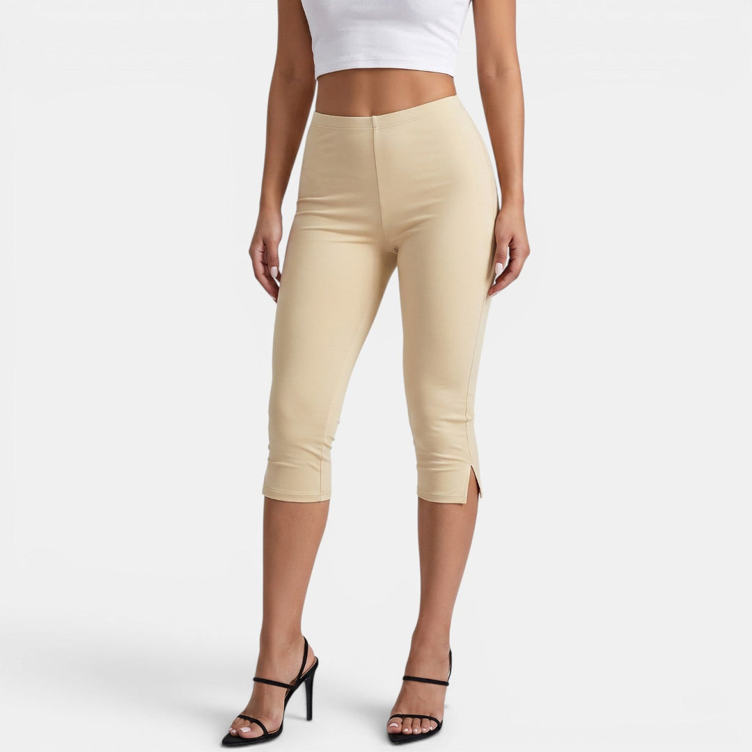 Pantalón capri moldeador de mujer para yoga y fitness. Legging deportivo de cintura alta para mayor comodidad.