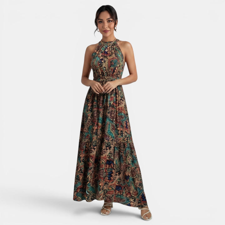 Vestido largo boho con estampado floral, cintura alta, estilo fluido, ideal para paseos de verano.