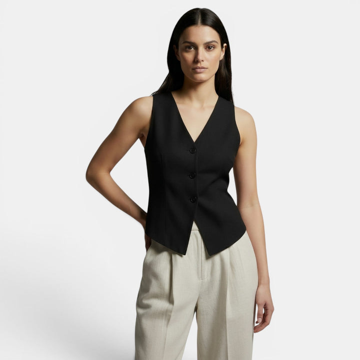 Chaleco elegante mujer slim fit con toque retro. Un básico para la moda femenina moderna y refinada.