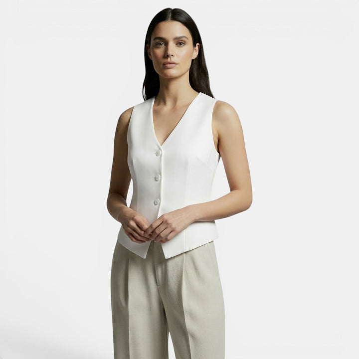 Chaleco mujer slim fit retro elegante. Perfecto para un look sofisticado y versátil de moda femenina.