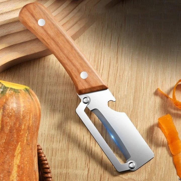 Pelador de verduras multicuchilla ergonómico de acero inoxidable, para cortes precisos en frutas y vegetales de cocina.