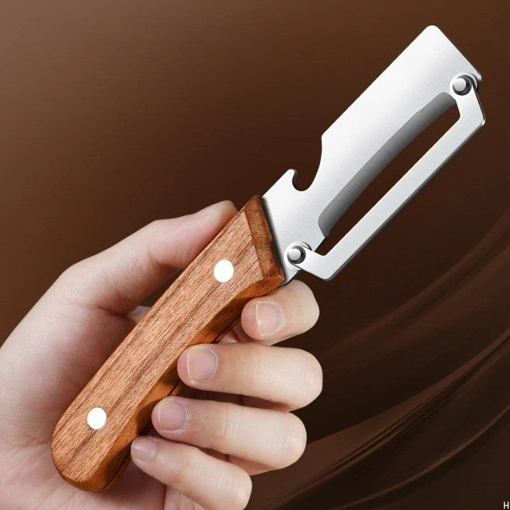 Pelador de cocina multicuchilla que facilita el corte preciso de verduras y frutas, utensilio esencial para todo chef.