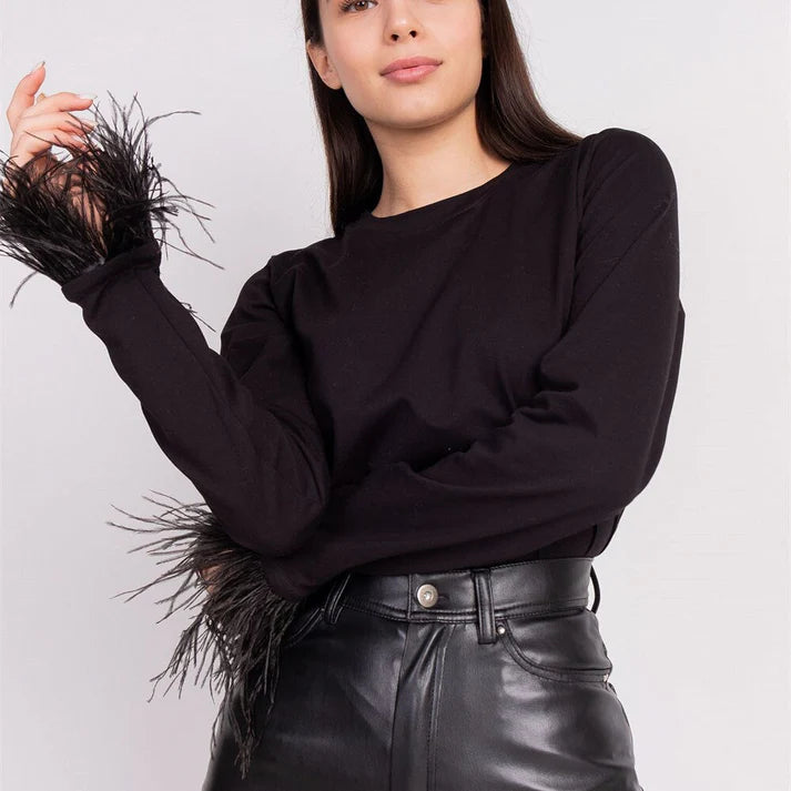 Pullover de manga larga con plumas para mujer, un top moderno y elegante que destaca en cualquier ocasión.