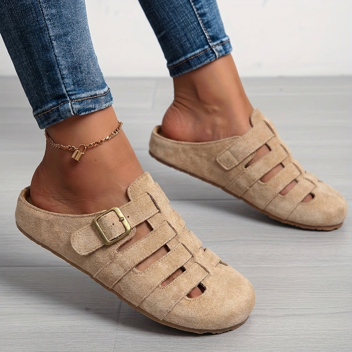 Mules transpirables de mujer, sandalias planas ideales para un look casual de verano.